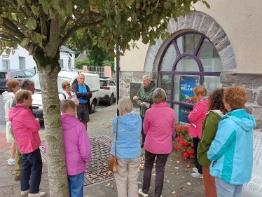 Crowd gathering for John Lyons History Tour of Louisburgh | Mary O'Malley
